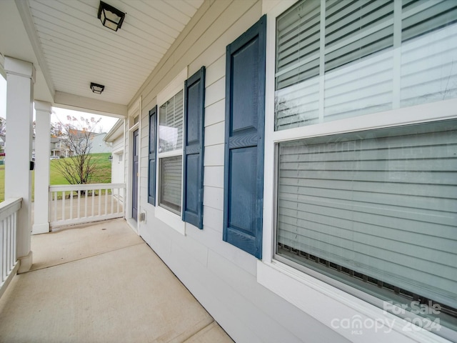 view of patio featuring a porch