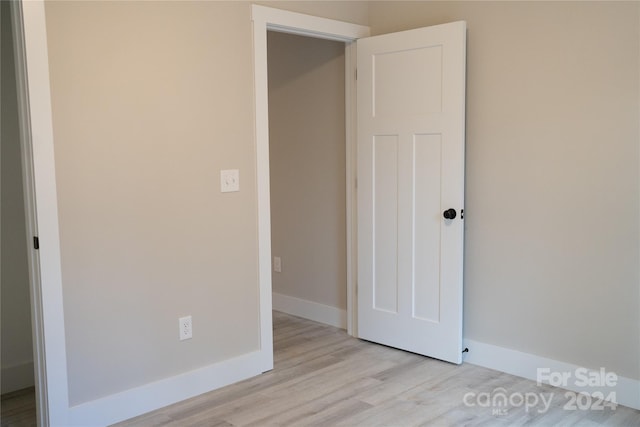 unfurnished bedroom featuring light hardwood / wood-style flooring