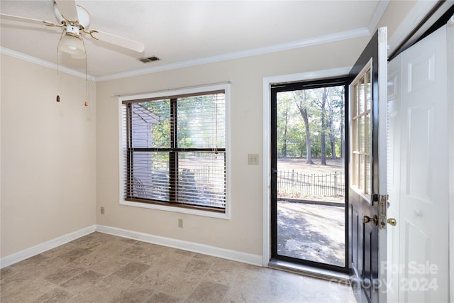 interior space featuring crown molding and ceiling fan