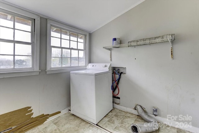 laundry room with plenty of natural light and washer / clothes dryer