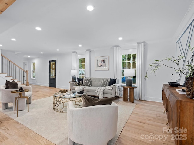 living room with light hardwood / wood-style floors