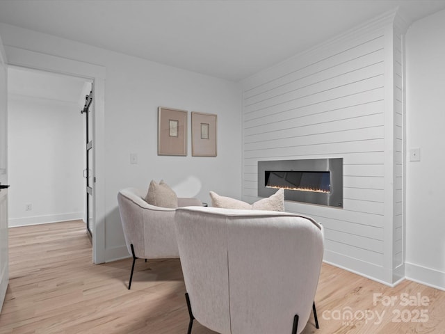 living room with light hardwood / wood-style floors