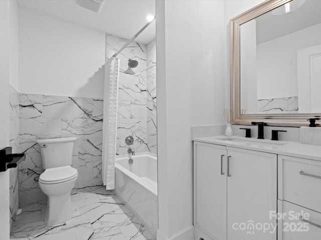 full bathroom featuring toilet, vanity, and shower / bath combo with shower curtain