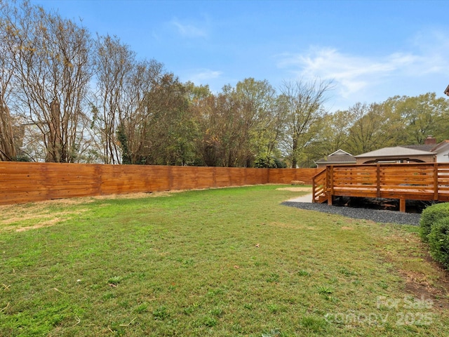 view of yard with a deck