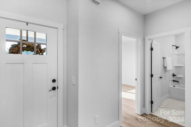 entrance foyer featuring light wood-type flooring