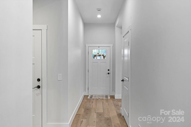 doorway featuring light wood-type flooring