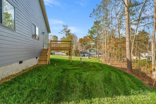 view of yard with a deck