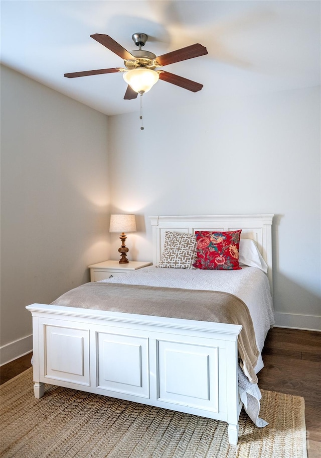 bedroom featuring ceiling fan and hardwood / wood-style flooring