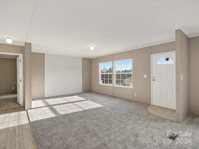 foyer with light hardwood / wood-style flooring