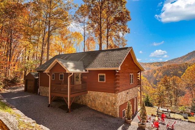 exterior space featuring a mountain view and a garage