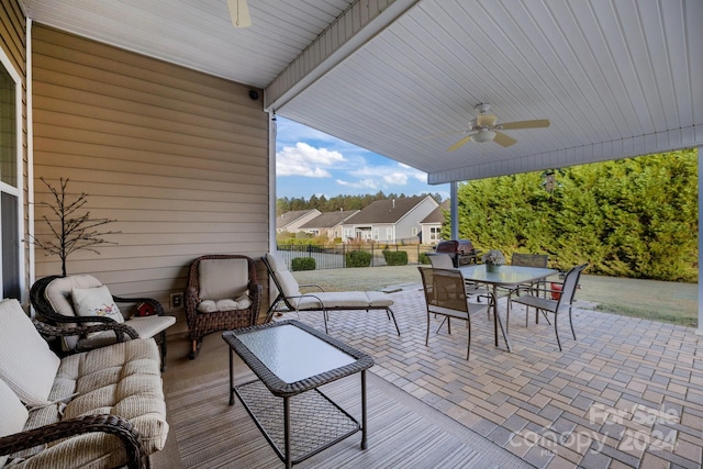 view of patio / terrace featuring ceiling fan