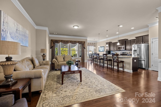 living room featuring dark hardwood / wood-style floors and ornamental molding