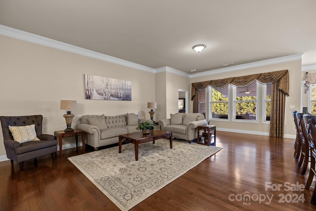 living room featuring ornamental molding and dark wood-type flooring