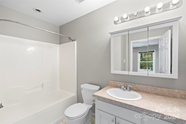 full bathroom featuring vanity, toilet, and bathing tub / shower combination