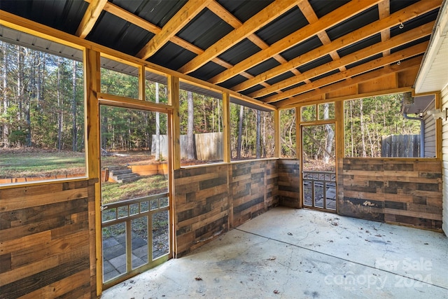 unfurnished sunroom featuring a healthy amount of sunlight