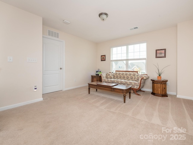 sitting room with light carpet