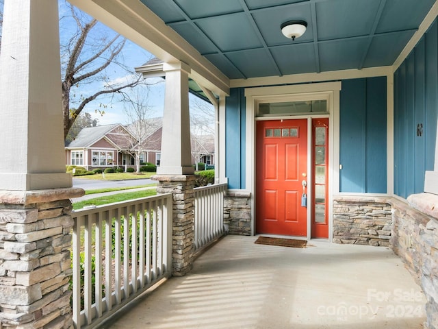 entrance to property with a porch