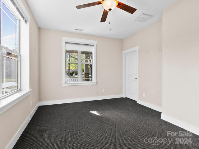 60 Westfield Way, Candler, NC 28715 - unfurnished room with a ceiling fan, dark carpet, and baseboards
