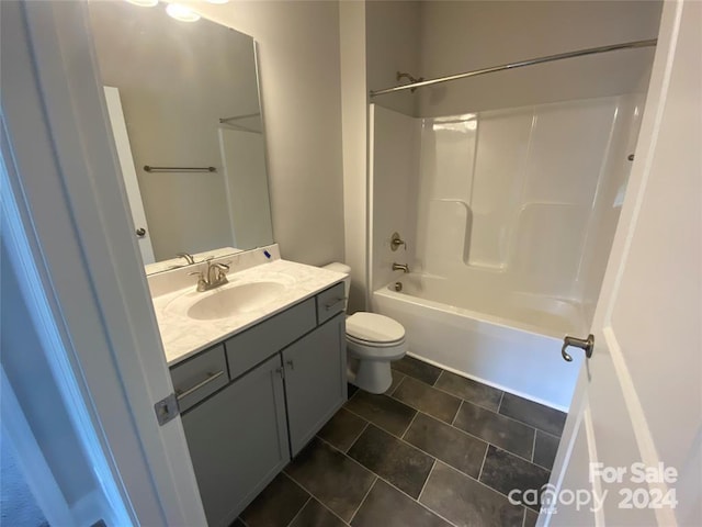 full bathroom featuring tile patterned floors, vanity, shower / bathtub combination, and toilet