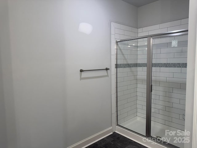 bathroom with an enclosed shower