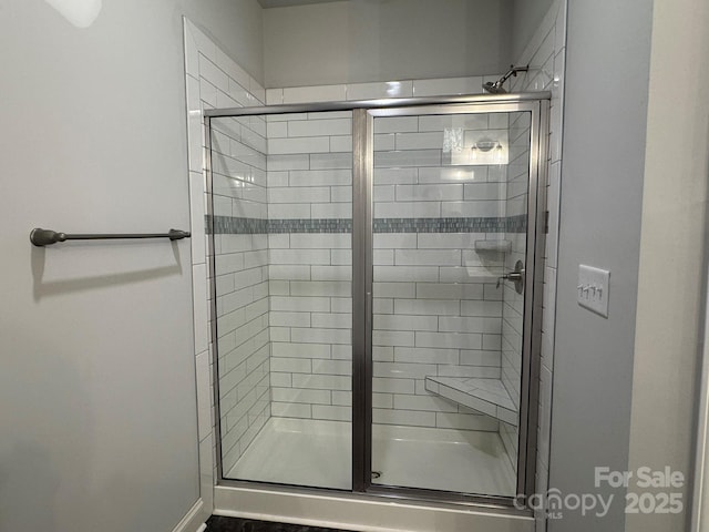 bathroom with an enclosed shower