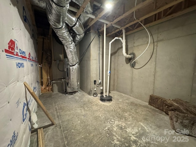 basement featuring heating unit