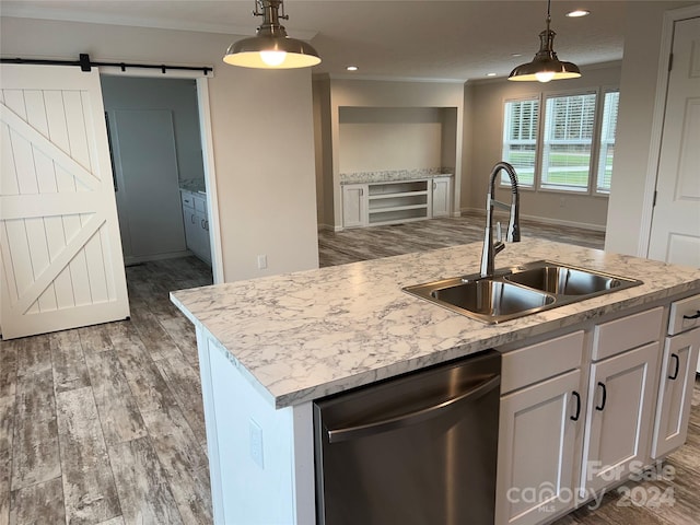 51 Rosemont Dr, Stony Point, NC 28678 - kitchen with stainless steel dishwasher, a sink, a barn door, a center island with sink, and crown molding