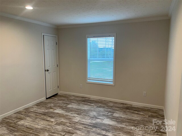 51 Rosemont Dr, Stony Point, NC 28678 - unfurnished room with wood finished floors, ornamental molding, and baseboards