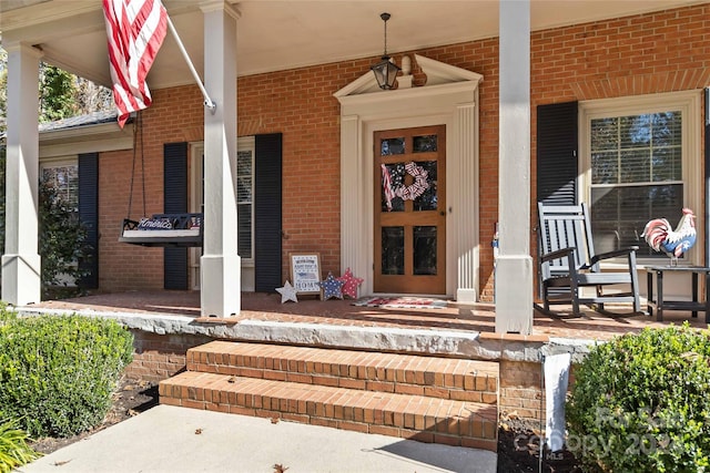 property entrance with a porch