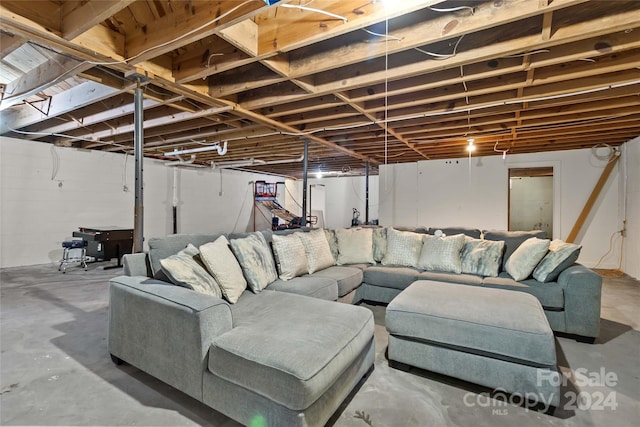 living room featuring concrete flooring