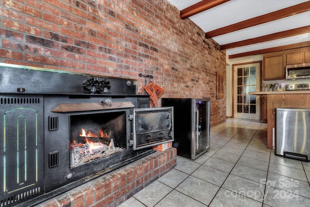 room details with beam ceiling and a fireplace