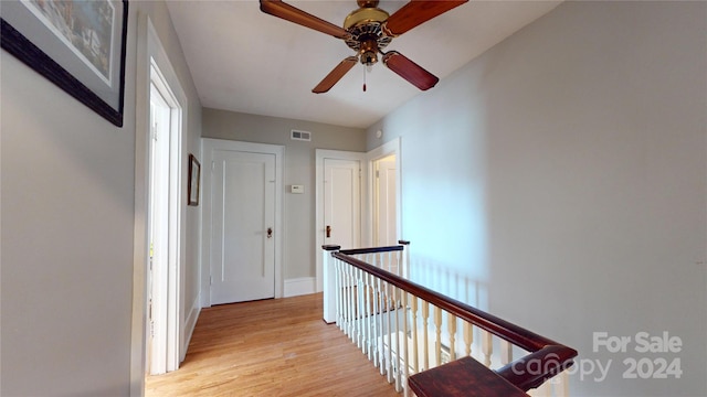 corridor featuring light hardwood / wood-style flooring