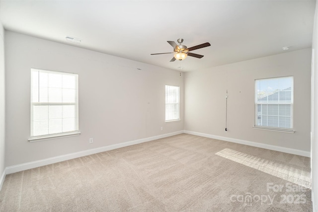 159 Rubys Way Unit 35, Oakboro, NC 28129 - spare room featuring light carpet, ceiling fan, and baseboards