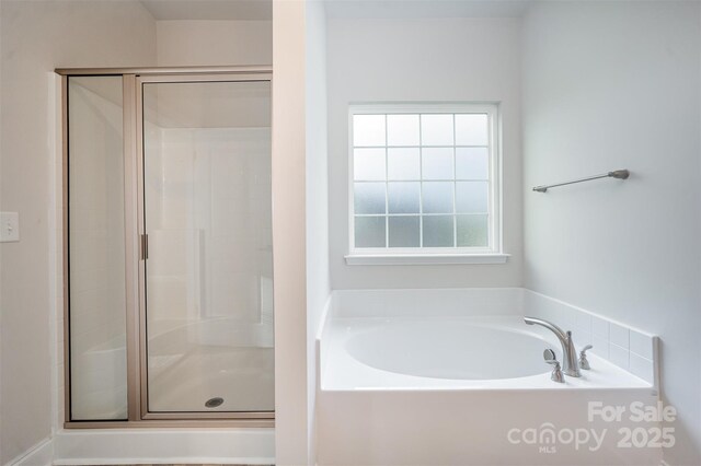 159 Rubys Way Unit 35, Oakboro, NC 28129 - bathroom with a shower stall and a bath