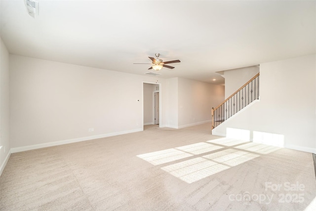 159 Rubys Way Unit 35, Oakboro, NC 28129 - unfurnished living room featuring stairs, carpet floors, a ceiling fan, and baseboards