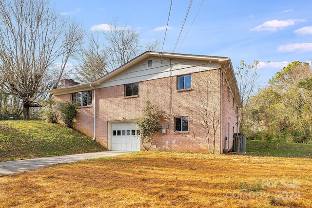 view of property exterior featuring a garage