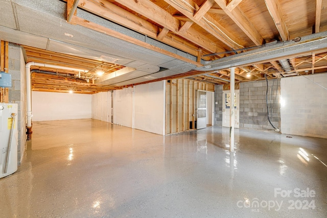 basement featuring electric water heater