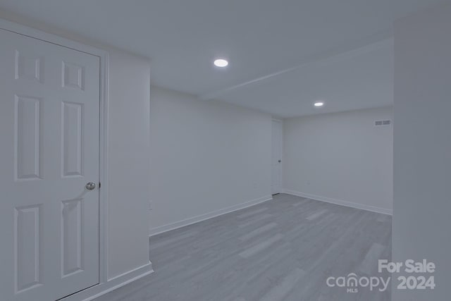 unfurnished room with light hardwood / wood-style flooring