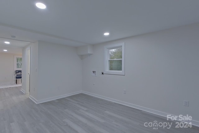 empty room with light hardwood / wood-style floors