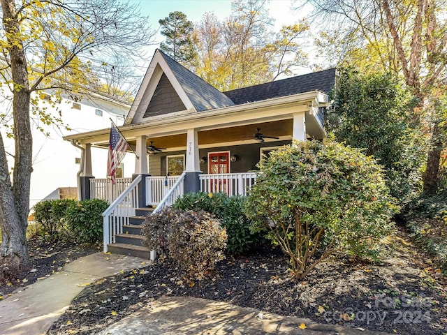 view of front of house with ceiling fan and a porch