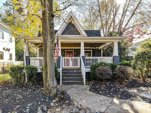 view of front of home featuring ceiling fan and a porch