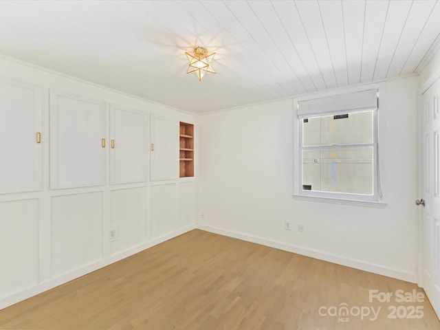 unfurnished bedroom featuring light wood-type flooring