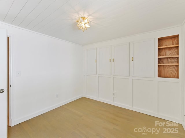 unfurnished room featuring light hardwood / wood-style flooring