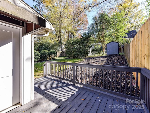 deck featuring a storage shed