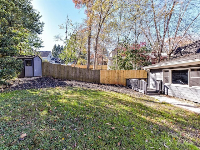 view of yard featuring a storage shed