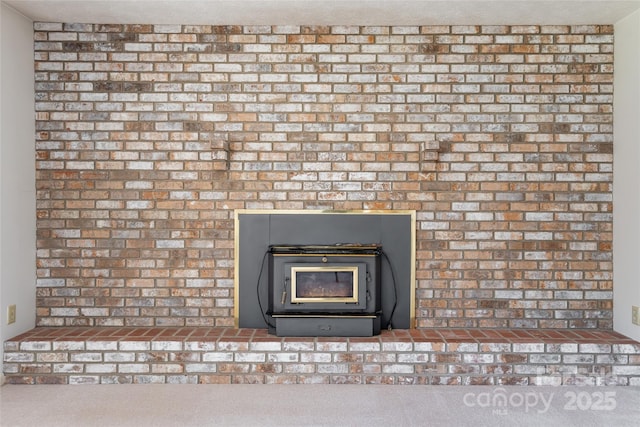 261 Lower Christ School Rd, Fletcher, NC 28732 - detailed view of a wood stove and carpet