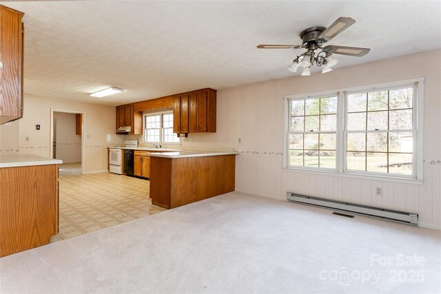 261 Lower Christ School Rd, Fletcher, NC 28732 - kitchen featuring electric range, baseboard heating, brown cabinets, a peninsula, and ceiling fan