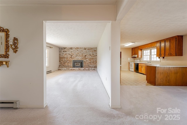261 Lower Christ School Rd, Fletcher, NC 28732 - unfurnished living room featuring a textured ceiling, light carpet, a baseboard heating unit, a fireplace, and a sink