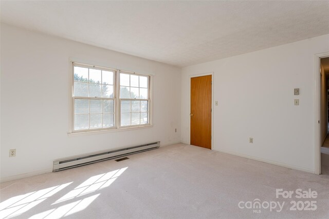 261 Lower Christ School Rd, Fletcher, NC 28732 - carpeted spare room with baseboard heating