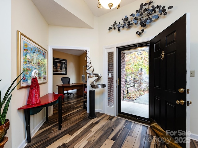 entryway with dark hardwood / wood-style floors